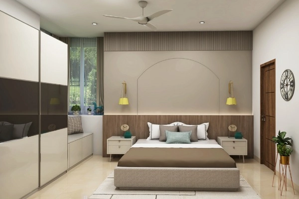 The Floor -to-ceiling sliding wardrobe in earthy toned bedroom